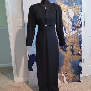 Patricia Rhodes Black full length long sleeved gown with cutouts